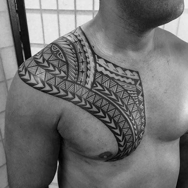 Gentleman With Unique Polynesian Tribal Tattoo On Upper Chest