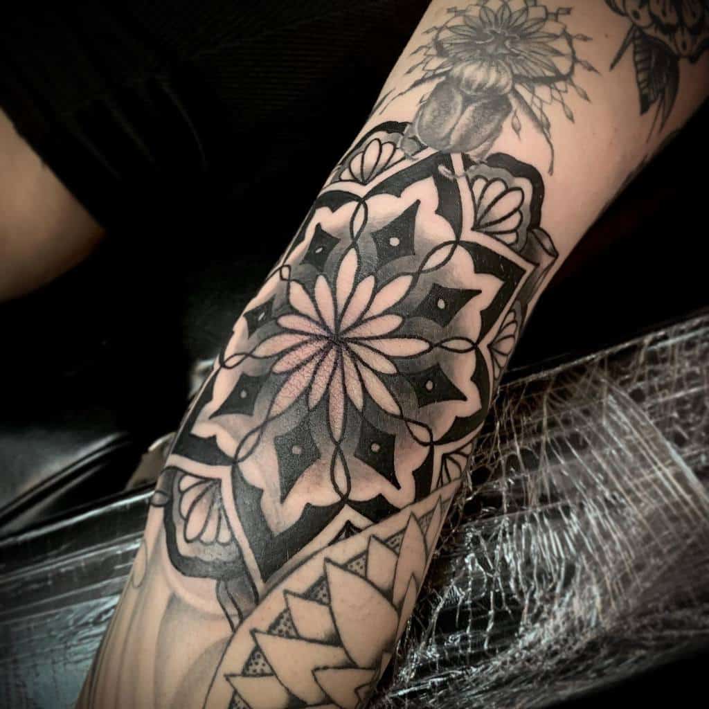 geometric black arm tattoo skylinetattoo