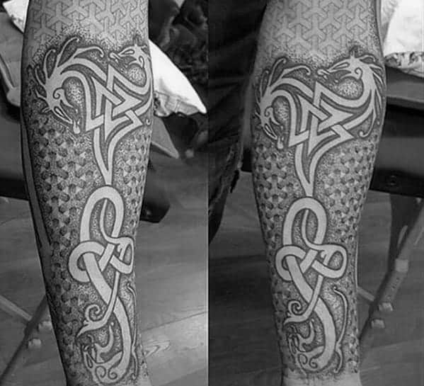 geometric-negative-space-celtic-dragon-forearm-sleeve-tattoos-for-men