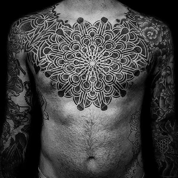 Geometric Upper Chest Tattoo Design On Man