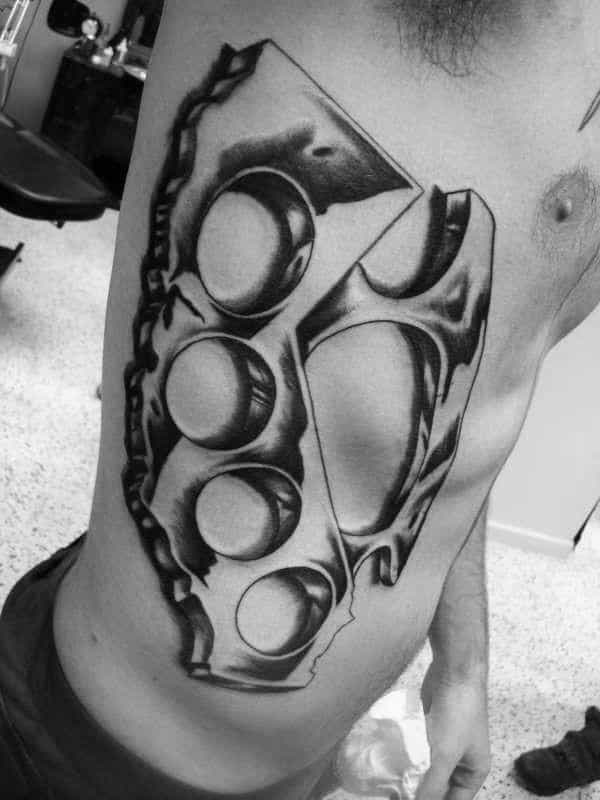 Giant Brass Knuckles Mens Full Rib Cage Side Tattoo Design Ideas