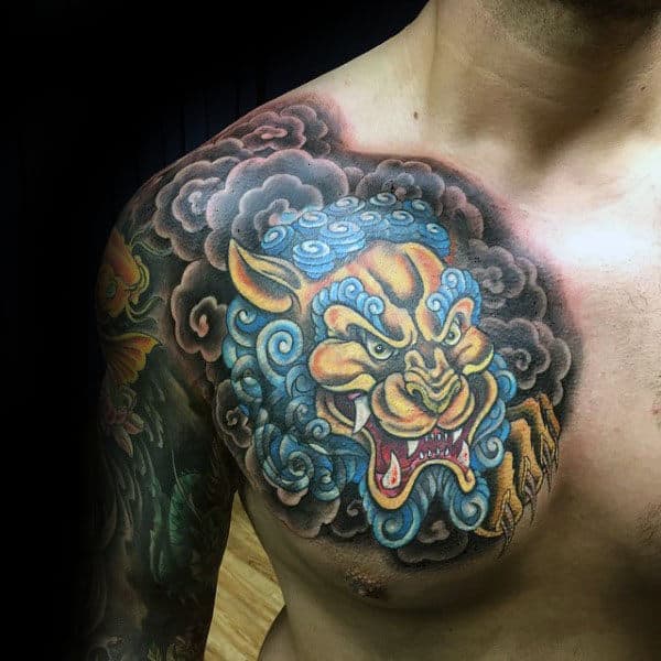 Gold And Blue Ink Foo Dog Upper Chest Tattoos For Guys