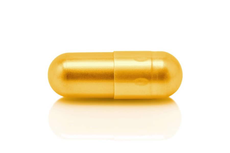 gold pill capsule
