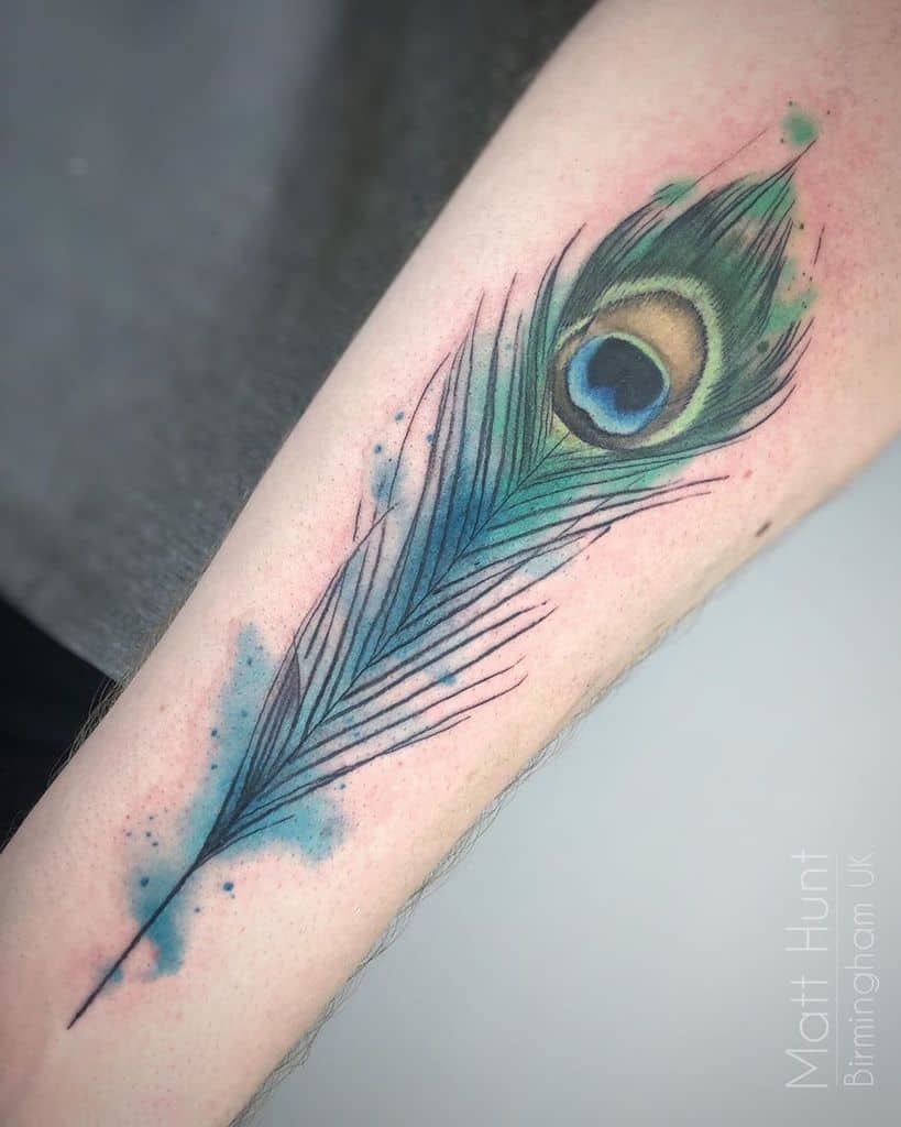 Elegant Peacock Feather Tattoos
