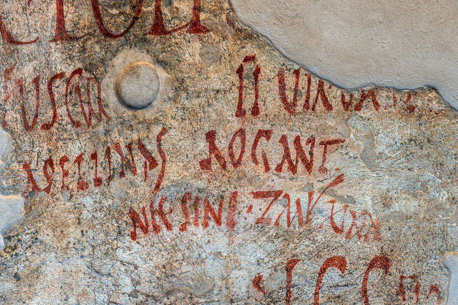 graffiti on wall uncovered in the excavations of Pompeii