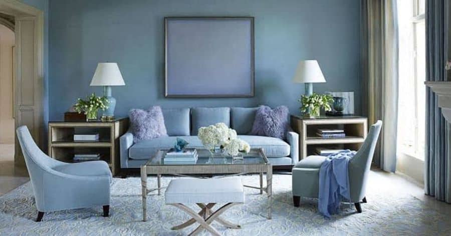 modern blue living room couch ottoman gray floor rug