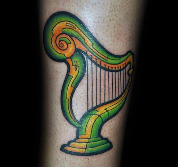 Green And Yellow Ink Forearm Male Harp Tattoo Design Inspiration