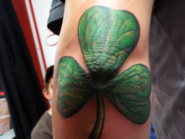 Green Elbow Shamrock Tattoo Ideas For Gentlemen