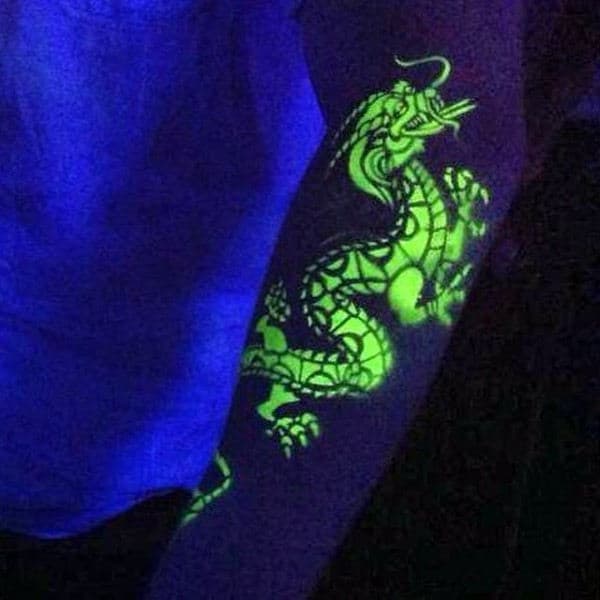 Green Glow In The Dark Dragon Tattoo Design For Men