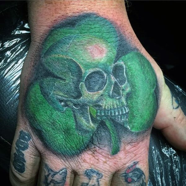 Skull in shamrock tattoo  Word tattoos on arm Shamrock tattoos Word  tattoos