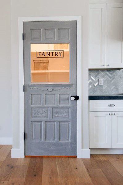 gray pantry door with window in kitchen 