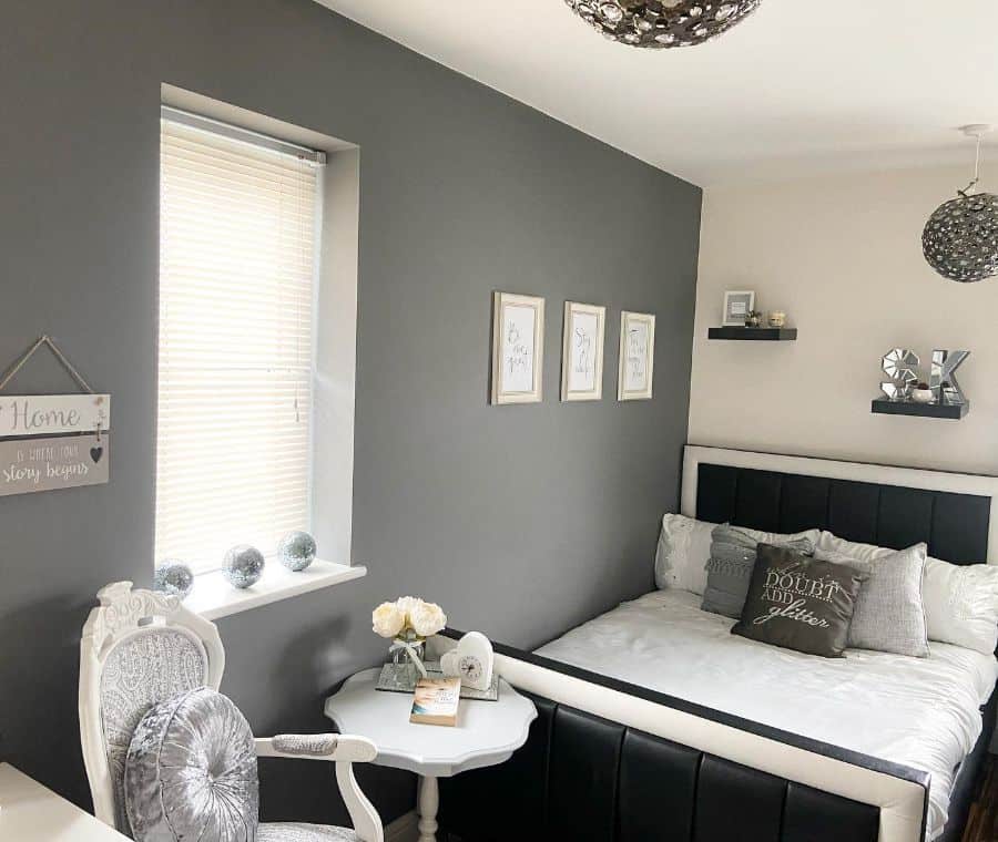 guest spare bedroom with gray accent wall