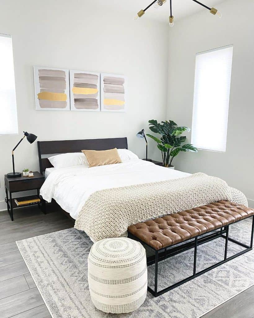 simple guest spare bedroom with ottoman 