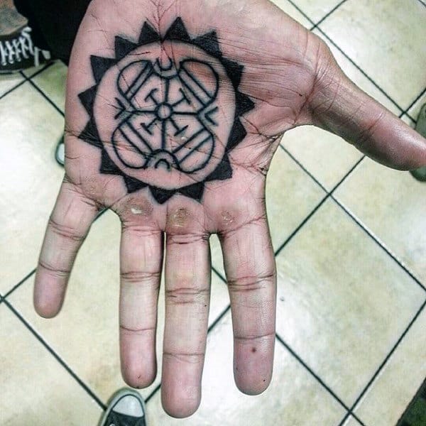 Guy Palm Religious Symbol Tattoo