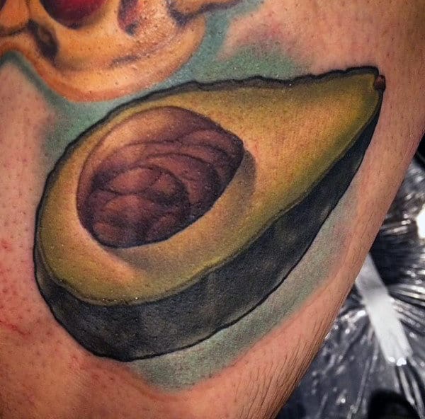 Guy With Avocado Food Tattoo On Chest