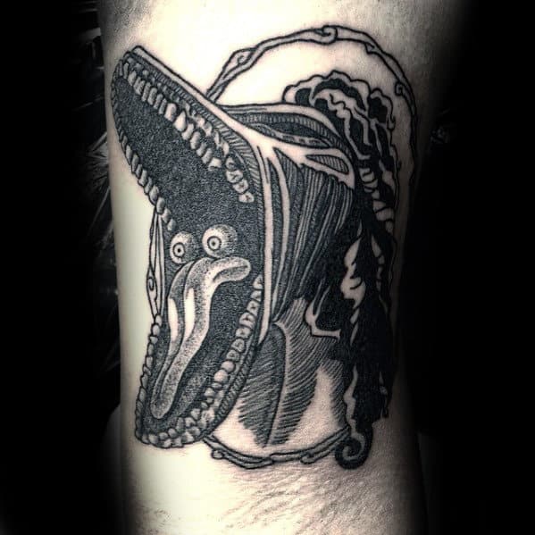 Guy With Beetlejuice Sandworm Detailed Tattoo On Arm