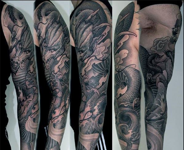 Guy With Black And Grey Shaded Full Arm Dragon Tattoo
