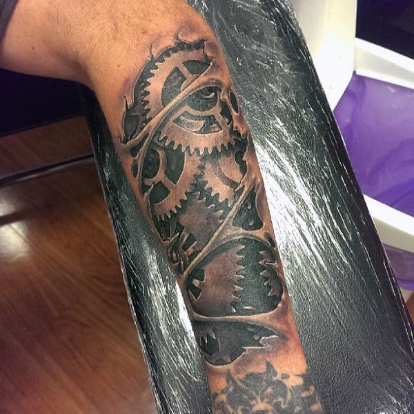 Guy With Black Greyish Steampunk Tattoo On Forearm