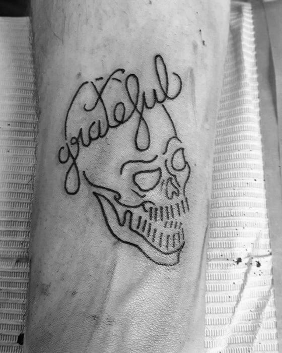 Guy With Black Ink Outline Skull Grateful Dead Tattoo Design