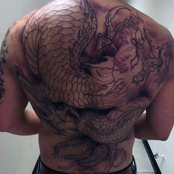 Guy With Black Ink Outline Tattoo Of Dragon On Full Back