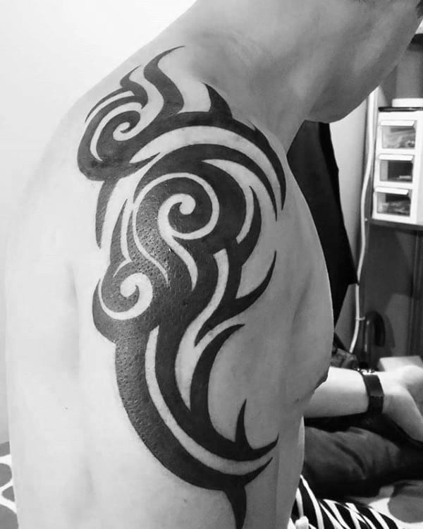 Guy With Classic Tribal Shoulder Solid Black Ink Tattoo