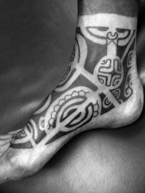 Guy With Cool Hawaiian Black Ink Foot Tribal Tattoo