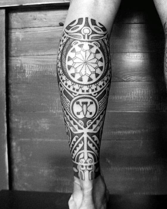 Guy With Cool Polynesian Leg Sleeve Tattoo