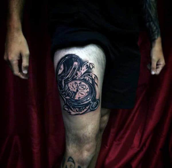 Guy With Filigree Pocket Watch Tattoo On Thigh