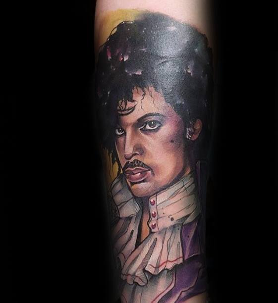 Guy With Forearm Sleeve Prince Tattoo Design