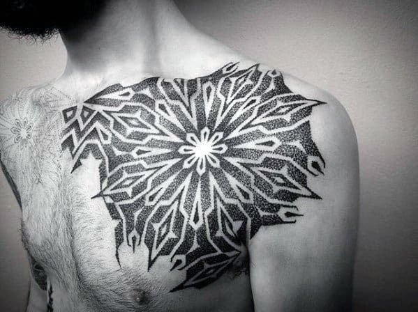 Guy With Geometric Chest And Shoulder Tattoo Design