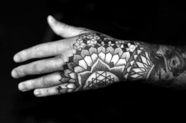 Guy With Geometric Hand Tattoo Design