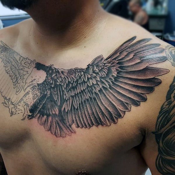 Guy With Gorgeous Winged Bald Eagle Tattoo On Chest