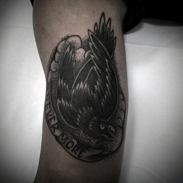 Guy With Grey Dotted Design Raven Tattoo And Sayings Arms