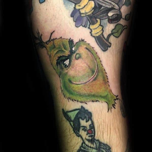 Guy With Grinch Tattoo Design