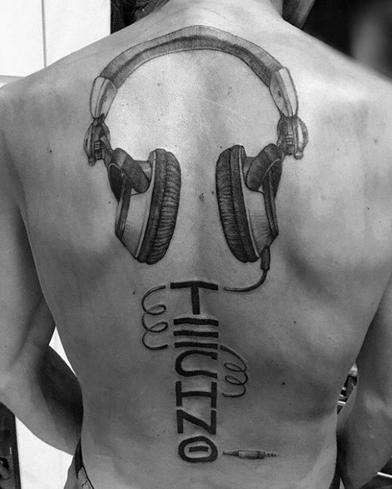 Guy With Headphones Tattoo Design Back And Spine
