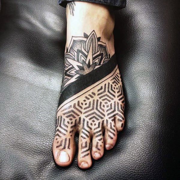 Guy With Hexagonal Tattoo With Dark Strip On Foot