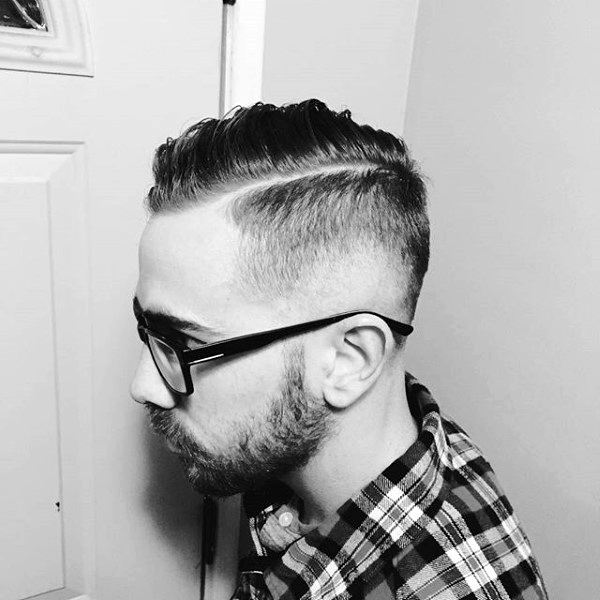 Guy With High Fade Comb Over Hair