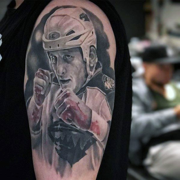 Guy With Hockey Sports Tattoo Design