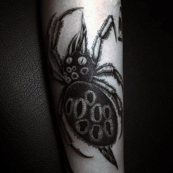 Guy With Horrific Spider Tattoo On Calves
