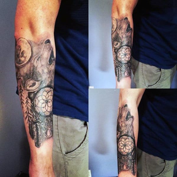 Guy With Howling Wolf Dreamcatcher Tattoos