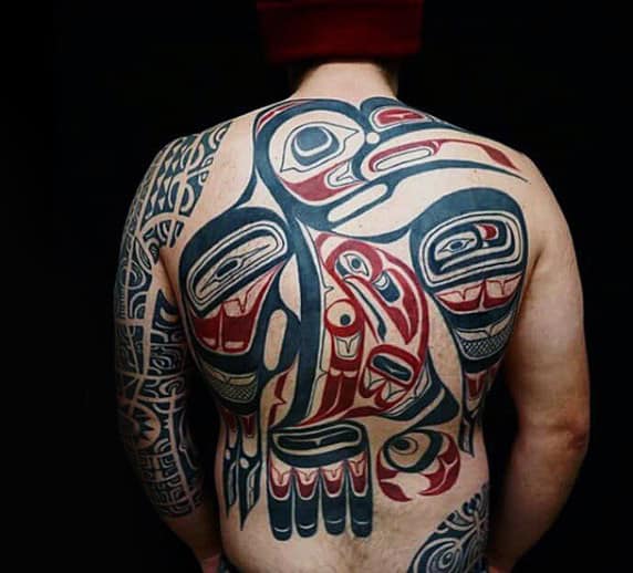 Guy With Huge Raven Haida Tattoo On Back