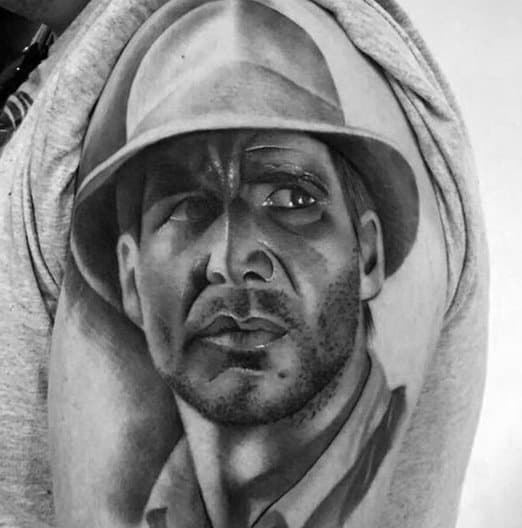 Guy With Indiana Jones Tattoo On Arm