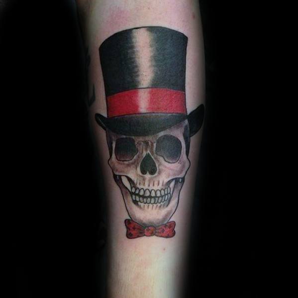 Guy With Inner Forearm Skull With Top Hat Tattoo Design