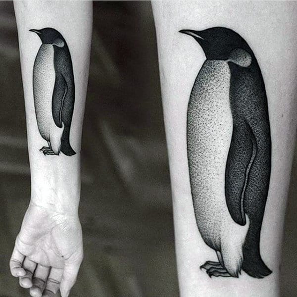 Guy With Inner Forearm Tattoo Of Dotwork Penguin Design
