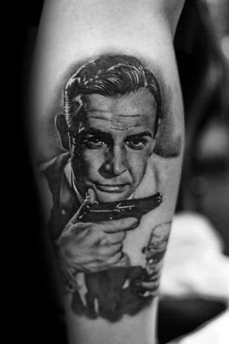 Guy With James Bond Leg Calf Portrait Tattoo Design