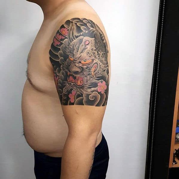 Guy With Japanese Demon Quarter Sleeve Tattoo
