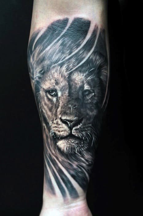 Guy With Lion Forearm Tattoo Design