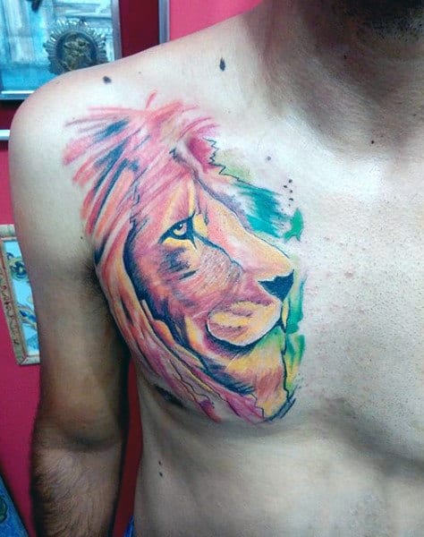 Guy With Lion Portrait Watercolor Tattoo On Chest