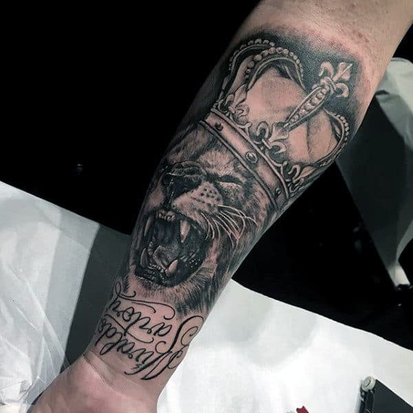 Guy With Lion With Crown Forearm Tattoo