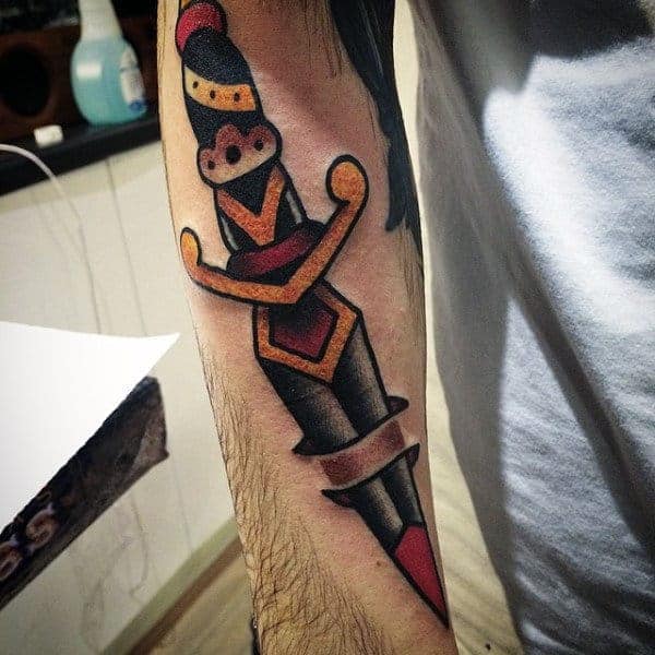 guy-with-lovely-traditonal-dagger-tattoo-on-forearms